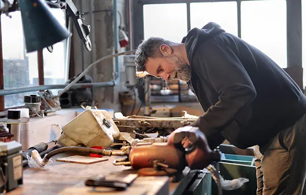 a repair man getting ready to fix a bosch